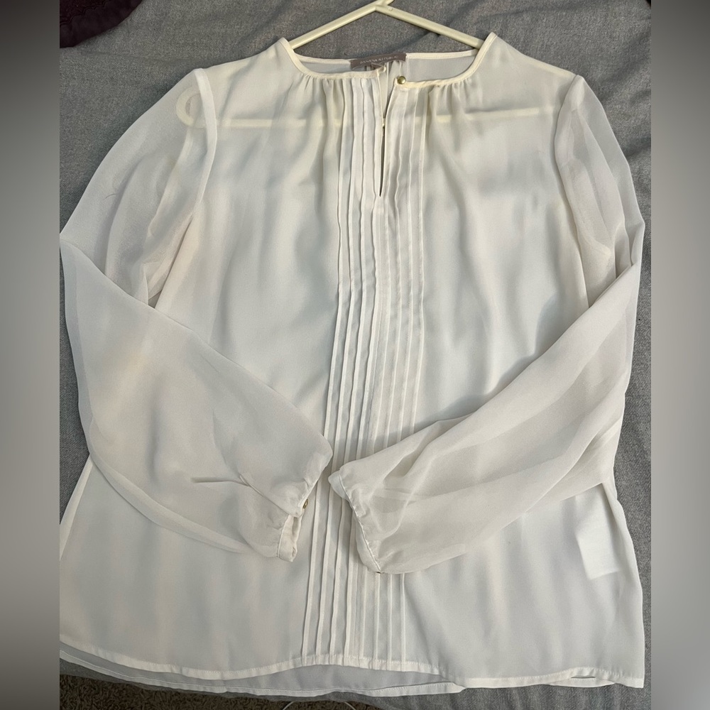 Sheer ivory banana republic top; gold accents.